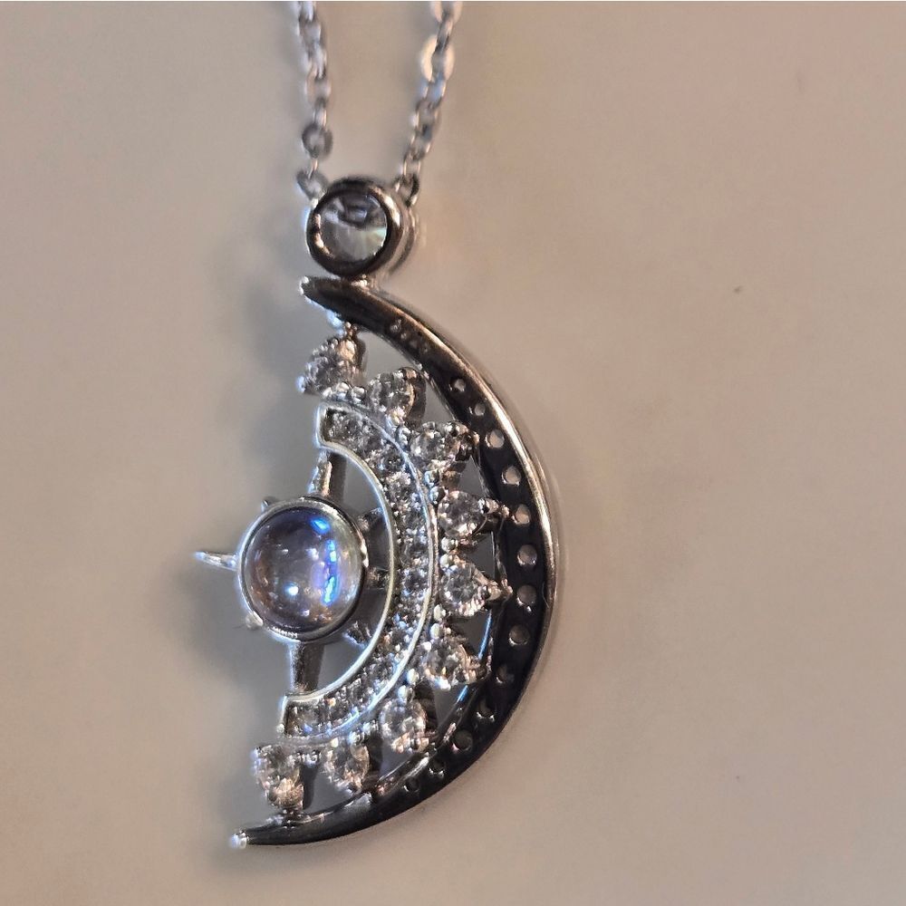 Celestial Silver Necklace with Moon and Star Pendant - Picture 2 of 9